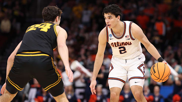 Mar 28, 2026; Houston, TX, USA; Illinois Fighting Illini guard Andrej Stojakovic (2) controls the ball against Iowa Hawkeyes guard Tate Sage (24) in the first half during an Elite Eight game of the South Regional of the men's 2026 NCAA Tournament at Toyota Center. Mandatory Credit: Troy Taormina-Imagn Images