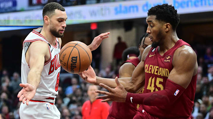 Jan 2, 2023; Cleveland, Ohio, USA; Cleveland Cavaliers guard Donovan Mitchell (45) and Chicago Bulls guard Zach LaVine (8) go for a rebound during the second half at Rocket Mortgage FieldHouse. Mandatory Credit: Ken Blaze-Imagn Images