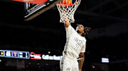 Cincinnati Bearcats guard Jizzle James (2) dunks the ball in the second half of a NCAA men’s basketball game between the Cincinnati Bearcats and Texas Tech Red Raiders, Tuesday, Jan. 21, 2025, at Fifth Third Arena in Cincinnati. Red Raiders won 81-71.