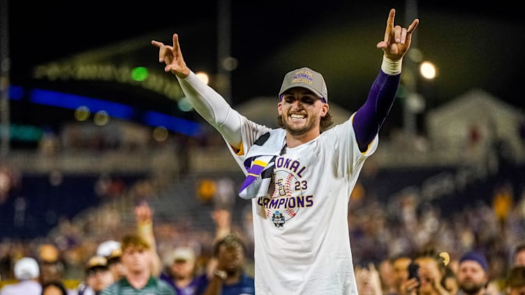 Jun 26, 2023; Omaha, NE, USA; LSU Tigers center fielder Dylan Crews (3) celebrates after winning the