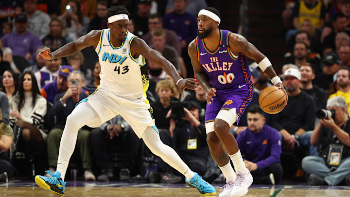 Indiana Pacers forward Pascal Siakam (43) defends against Phoenix Suns forward Royce O'Neale (00) at Footprint Center. Mandatory Credit: Mark J. Rebilas-Imagn Images