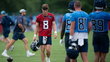 Tennessee Titans quarterback Will Levis (8) heads for a water bottle on the second day of training camp Thursday, July 25, 2024.