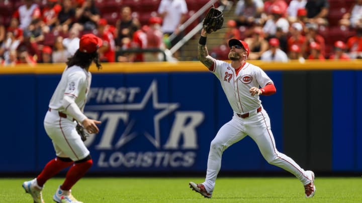 Aug 18, 2024; Cincinnati, Ohio, USA; Cincinnati Reds outfielder Jake Fraley (27) catches a pop up hit by Kansas City Royals designated hitter Vinnie Pasquantino (not pictured) in the first inning at Great American Ball Park. Mandatory Credit: Katie Stratman-USA TODAY Sports