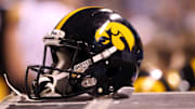 Dec 5, 2015; Indianapolis, IN, USA; A Iowa Hawkeyes helmet sits on the side line during the the Big Ten Conference football championship game between the Iowa Hawkeyes and the Michigan State Spartans at Lucas Oil Stadium. Mandatory Credit: Aaron Doster-Imagn Images