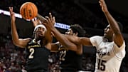 Feb 26, 2025; College Station, Texas, USA; Vanderbilt Commodores guard MJ Collins Jr. (2), forward Jaylen Carey (22) and Texas A&M Aggies forward Henry Coleman III (15) battle for the rebound during the first half at Reed Arena. Mandatory Credit: Maria Lysaker-Imagn Images 