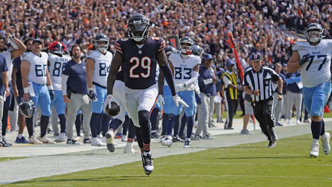 Sep 8, 2024; Chicago, Illinois, USA; Chicago Bears cornerback Tyrique Stevenson (29) intercepts a pass against the Tennessee Titans for a touchdown during the second half at Soldier Field. Mandatory Credit: David Banks-Imagn Images