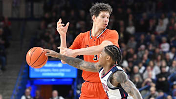 Dec 18, 2024; Spokane, Washington, USA; Gonzaga Bulldogs guard Khalif Battle (99) knocked the ball away from Bucknell Bison center Noah Williamson (3) in the second half at McCarthey Athletic Center. Gonzaga Bulldogs won 86-65. Mandatory Credit: James Snook-Imagn Images