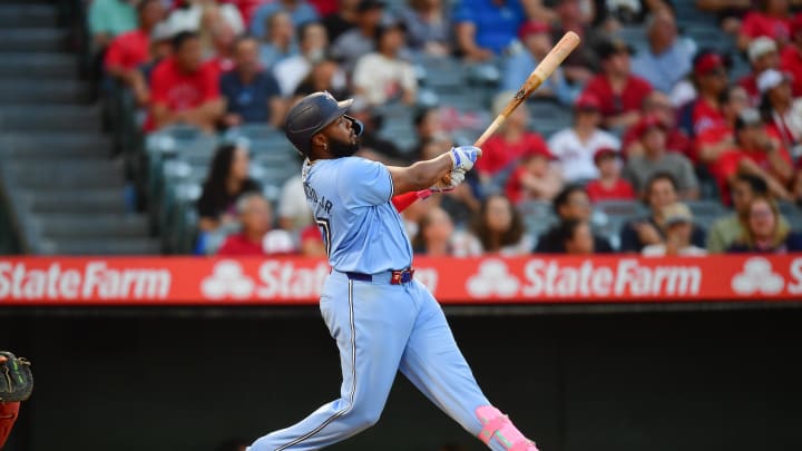 Toronto Blue Jays first baseman Vladimir Guerrero Jr. (27) hits a solo home run against the Los Angeles Angels during the third inning at Angel Stadium on Aug 13.