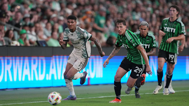 Portland Timbers forward Antony (11) plays the ball defended by Austin FC defender Guilherme Biro (29) in the second half at Q2 Stadium 