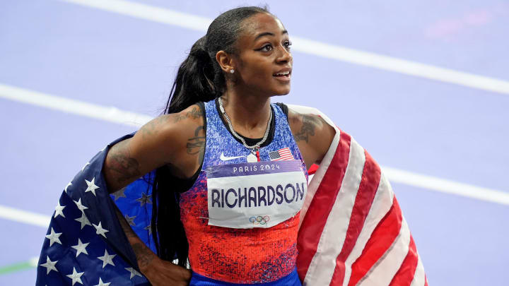 Aug 3, 2024; Paris Saint-Denis, France; Sha'carri Richardson (USA) reacts after finishing in second in the womenís 100m final during the Paris 2024 Olympic Summer Games at Stade de France. 