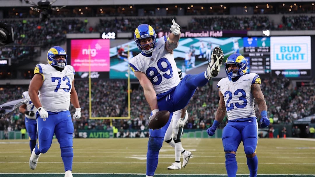 Jan 19, 2025; Philadelphia, Pennsylvania, USA; Los Angeles Rams tight end Tyler Higbee (89) celebrates after scoring a touchdown in the first quarter against the Philadelphia Eagles in a 2025 NFC divisional round game at Lincoln Financial Field. Mandatory Credit: Bill Streicher-Imagn Images