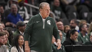 Nov 12, 2024; Atlanta, Georgia, USA; Michigan State Spartans head coach Tom Izzo reacts on the bench against the Kansas Jayhawks during the first half at State Farm Arena. Mandatory Credit: Dale Zanine-Imagn Images