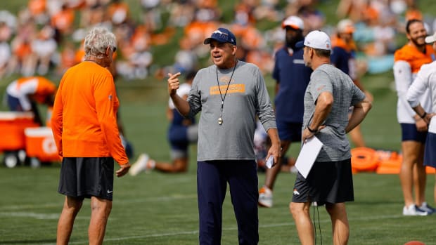 Jul 26, 2024; Englewood, CO, USA; Denver Broncos head coach Sean Payton (C) during training camp at Broncos Park Powered by C