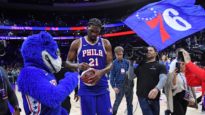 Apr 2, 2024; Philadelphia, Pennsylvania, USA; Philadelphia 76ers center Joel Embiid (21) autographs - Eric Hartline/USA Today Sports