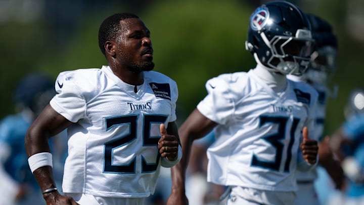 Tennessee Titans safety Xavier Woods (25) runs through drills during the Tennessee Titans second day of training camp at Ascension Saint Thomas Sports Park in Nashville, Tenn., Thursday, July 24, 2025.