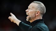 Louisville Cardinals head coach Pat Kelsey coaches from the sideline as the Cards play against visiting Bucknell at the KFC Yum! Center in Louisville, Kentucky Tuesday October 28, 2028.