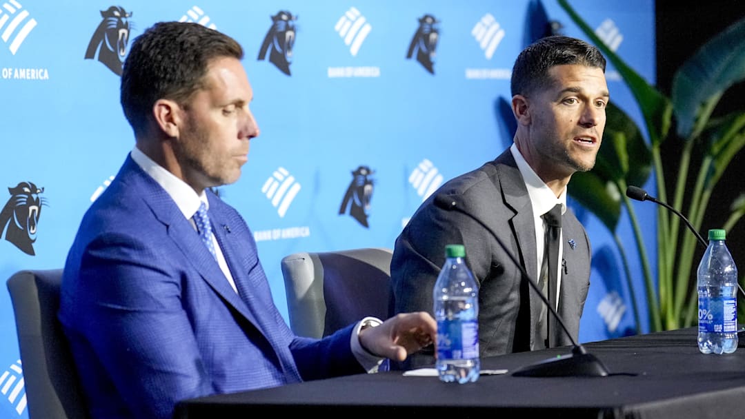 Carolina Panthers general manager Dan Morgan (left) speaks with new coach Dave Canales during the introductory press conference at Bank of America Stadium.