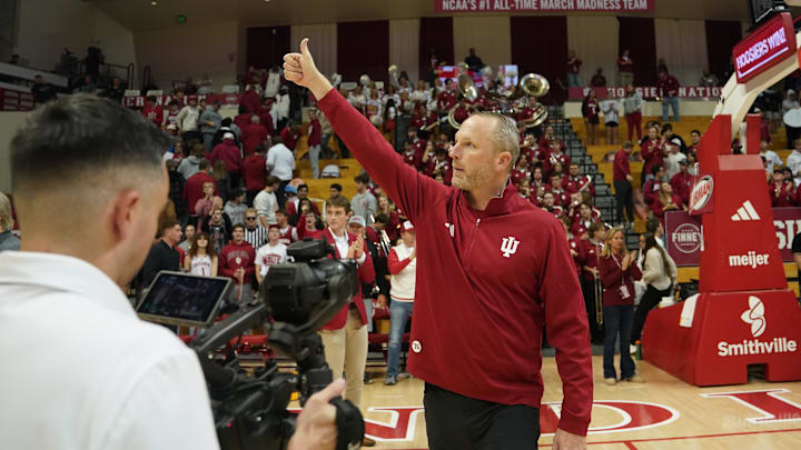 Nov 5, 2025; Bloomington, Indiana, USA; Indiana Hoosiers head coach Darian Devries celebrates after the game against the Alabama A&M Bulldogs at Simon Skjodt Assembly Hall. Mandatory Credit: Robert Goddin-Imagn Images