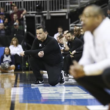 Xavier Musketeers head coach Sean Miller watches from the sideline during the second half of an NCAA tournament 