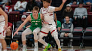 Dec 3, 2024; Stanford, California, USA; Utah Valley Wolverines guard Tanner Toolson (5) is guarded by Stanford Cardinal guard Oziyah Sellers (4) during the first quarter at Maples Pavilion. Mandatory Credit: Neville E. Guard-Imagn Images