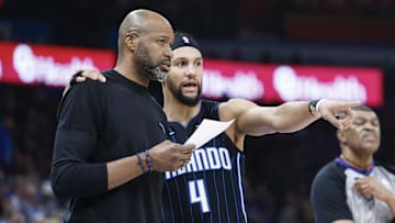 Jan 13, 2024; Oklahoma City, Oklahoma, USA; Orlando Magic guard Jalen Suggs (4) talks to head coach Jamahl Mosley during the second quarter at Paycom Center. Mandatory Credit: Alonzo Adams-Imagn Images
