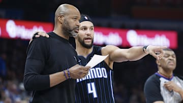 Jan 13, 2024; Oklahoma City, Oklahoma, USA; Orlando Magic guard Jalen Suggs (4) talks to head coach Jamahl Mosley during the second quarter at Paycom Center. Mandatory Credit: Alonzo Adams-Imagn Images