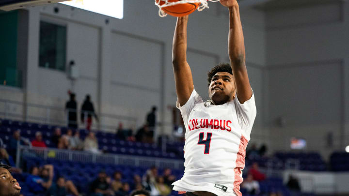 Columbus Explorers guard Jase Richardson dunks during the third quarter of a game against the Archbishop Ryan Raiders during the 50th annual City of Palms Classic at Suncoast Credit Union Arena in Fort Myers on Tuesday, Dec. 19, 2023.