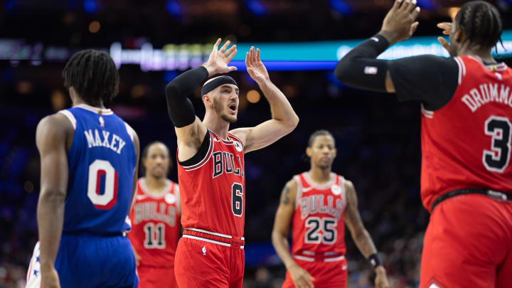 Dec 18, 2023; Philadelphia, Pennsylvania, USA; Chicago Bulls guard Alex Caruso (6) reacts with center Andre Drummond (3) after scoring against the Philadelphia 76ers during the third quarter at Wells Fargo Center. Mandatory Credit: Bill Streicher-USA TODAY Sports
