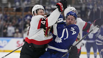 Apr 20, 2025; Toronto, Ontario, CAN; Ottawa Senators defenseman Tyler Kleven (43) hits Toronto Maple Leafs forward Bobby McMann (74) during the third period of game one of the first round of the 2025 Stanley Cup Playoffs at Scotiabank Arena. Mandatory Credit: John E. Sokolowski-Imagn Images