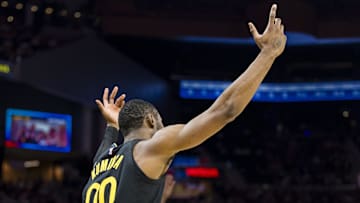 Mar 20, 2025; San Francisco, California, USA; Golden State Warriors forward Jonathan Kuminga (00) reacts after hitting a three-point shot against the Toronto Raptors during the second quarter at Chase Center. Mandatory Credit: John Hefti-Imagn Images