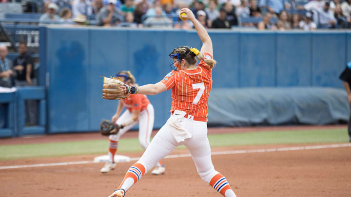 oJun 2, 2024; Oklahoma City, OK, USA;  Florida Gators starting pitcher Keagan Rothrock (7) throws a pitch in the first inning against the Alabama Crimson Tide during a Women's College World Series softball losers bracket elimination game at Devon Park. Mandatory Credit: Brett Rojo-Imagn Images