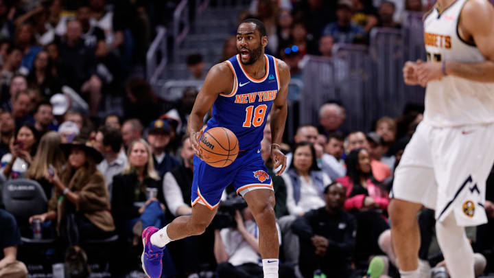 Mar 21, 2024; Denver, Colorado, USA; New York Knicks guard Alec Burks (18) dribbles the ball up court in the fourth quarter against the Denver Nuggets at Ball Arena. Mandatory Credit: Isaiah J. Downing-USA TODAY Sports
