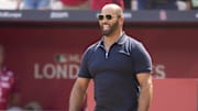 Jun 25, 2023; London, GBR, ENG; St. Louis Cardinals former first baseman Albert Pujols walks on the field before throwing out a ceremonial first pitch before London series game two against the Chicago Cubs at London Stadium. Mandatory Credit: Peter van den Berg-Imagn Images