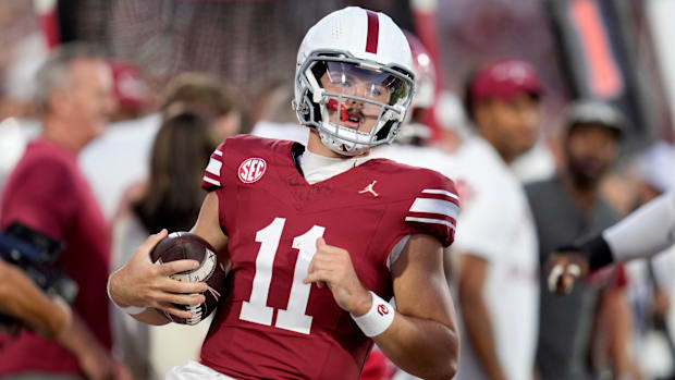 Oklahoma Sooners quarterback Jackson Arnold steps out of bounds against Houston.