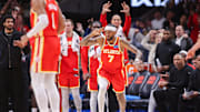 Dec 5, 2025; Atlanta, Georgia, USA; Atlanta Hawks guard Nickeil Alexander-Walker (7) reacts after a basket against the Denver Nuggets in the fourth quarter at State Farm Arena. Mandatory Credit: Brett Davis-Imagn Images
