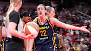 Indiana Fever guard Caitlin Clark objects to a call by a referee, during a game against the New York Liberty.