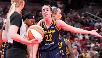Indiana Fever guard Caitlin Clark objects to a call by a referee, during a game against the New York Liberty.