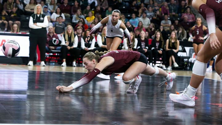 Western Christian's Olivia Ten Napel (13) dives for the ball in the Class 3A state volleyball championship against Mount Vernon Thursday, Nov. 7, 2024 at Xtream Arena in Coralville, Iowa.