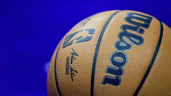 Mar 4, 2024; Salt Lake City, Utah, USA; A detail view of a basketball on the court between the Utah Jazz and the Washington Wizards during the second half at the Delta Center. Mandatory Credit: Christopher Creveling-USA TODAY Sports