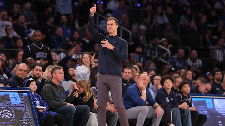 Dec 20, 2025; New York, New York, USA; Duke Blue Devils head coach Jon Scheyer coaches against the Texas Tech Red Raiders during the first half at Madison Square Garden. 