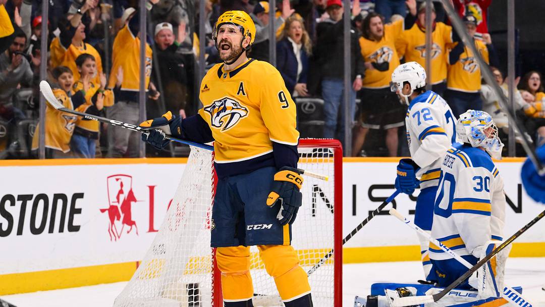 Feb 2, 2026; Nashville, Tennessee, USA;  Nashville Predators left wing Filip Forsberg (9) celebrates his goal against the St. Louis Blues during the second period at Bridgestone Arena. Mandatory Credit: Steve Roberts-Imagn Images