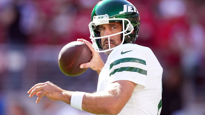 New York Jets quarterback Aaron Rodgers (8) warms up before the game against the San Francisco 49ers at Levi's Stadium.