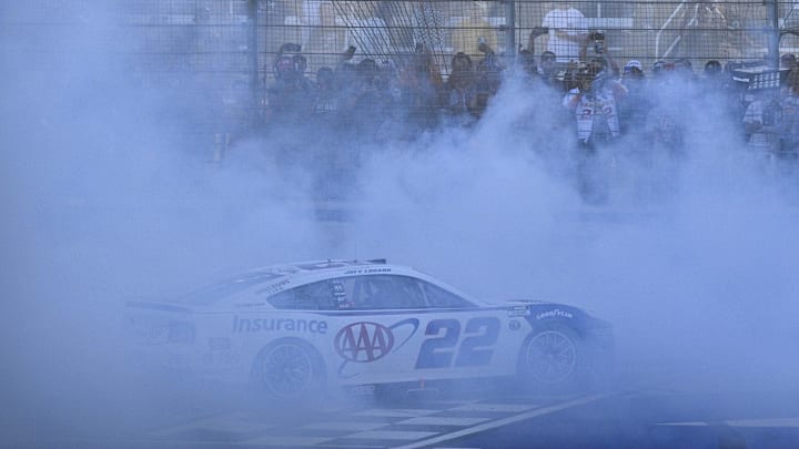 May 4, 2025; Fort Worth, Texas, USA; NASCAR Cup Series driver Joey Logano (22) performs a burnout as he celebrates winning the Wurth 400 race at Texas Motor Speedway. Mandatory Credit: Jerome Miron-Imagn Images May 4, 2025; Fort Worth, Texas, USA; NASCAR Cup Series driver Joey Logano (22) performs a burnout as he celebrates winning the Wurth 400 race at Texas Motor Speedway. Mandatory Credit: Jerome Miron-Imagn Images