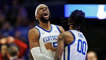 Jan 18, 2025; Lexington, Kentucky, USA; Kentucky Wildcats forward Ansley Almonor (15) celebrates with guard Otega Oweh (00) during the second half against the Alabama Crimson Tide at Rupp Arena at Central Bank Center. Mandatory Credit: Jordan Prather-Imagn Images