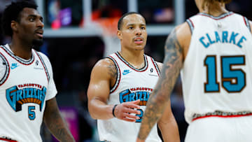Mar 17, 2025; Sacramento, California, USA; Memphis Grizzlies guard Desmond Bane (22) talks with forward Brandon Clarke (15) during a timeout during the third quarter against the Sacramento Kings at Golden 1 Center. Mandatory Credit: Sergio Estrada-Imagn Images