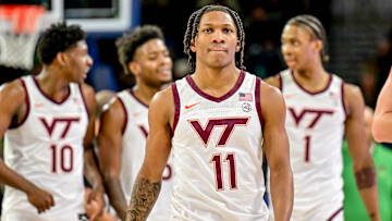 Feb 8, 2025; South Bend, Indiana, USA; Virginia Tech Hokies guard Ben Hammond (11) walks to the bench during a timeout in the first half against the Notre Dame Fighting Irish at the Purcell Pavilion. Mandatory Credit: Matt Cashore-Imagn Images
