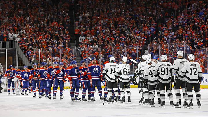 The Edmonton Oilers and the Los Angeles Kings shake hands after Oilers win series