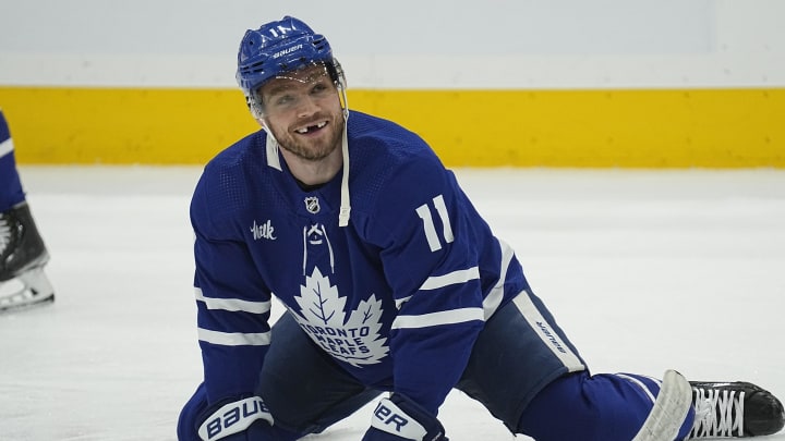 Apr 3, 2024; Toronto, Ontario, CAN; Toronto Maple Leafs forward Max Domi (11) stretches during the warm up before a game against the Tampa Bay Lightning at Scotiabank Arena. Mandatory Credit: John E. Sokolowski-USA TODAY Sports