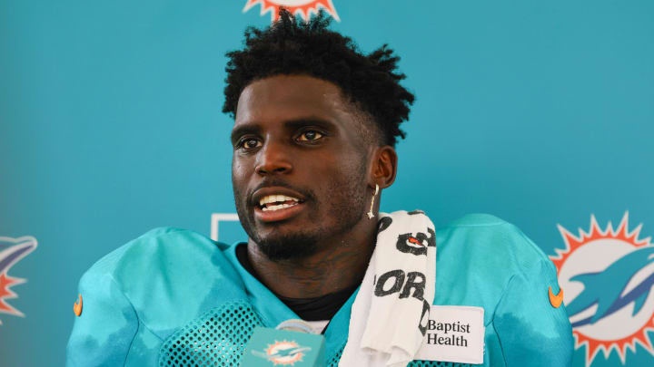 Aug 6, 2024; Miami Gardens, FL, USA; Miami Dolphins wide receiver Tyreek Hill (10) talks to reporters after a joint practice with the Atlanta Falcons at Baptist Health Training Complex.