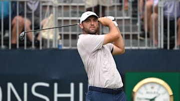Scottie Scheffler watches his tee shot on the first hole during the third round of the BMW Championship golf tournament